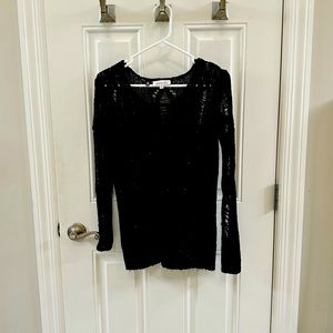 Jennifer Lopez see thru sweater.